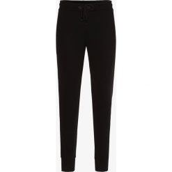 Tommy Hilfiger - Spodnie dresowe męskie, czarny. Czarne spodnie męskie xxl, z bawełny. Za 379,95 zł.