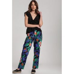 Granatowe Spodnie Petinassa. Niebieskie spodnie damskie Renee, xl, bez wzorów, z tkaniny. W wyprzedaży za 44,99 zł.