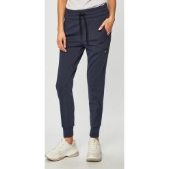 Reebok - Spodnie. Niebieskie spodnie damskie Reebok, s, z poliesteru. Za 229,90 zł.