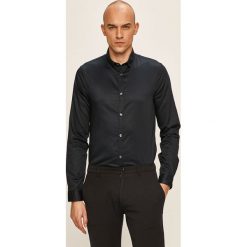 Armani Exchange - Koszula. Niebieskie koszule męskie Armani Exchange, xl, bez wzorów, z bawełny, eleganckie, z klasycznym kołnierzykiem, z długim rękawem. W wyprzedaży za 239,90 zł.
