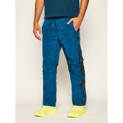 Spodnie dresowe TOMMY HILFIGER LEWIS HAMILTON Lh Track MW0MW13673. Niebieskie jeansy męskie TOMMY HILFIGER, m, bez wzorów. W wyprzedaży za 319,00 zł.