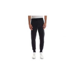 Spodnie z pięcioma kieszeniami Converse 10006108 FLEECE PANT RUBBER. Niebieskie spodnie męskie Converse, xl, bez wzorów. Za 198,45 zł.