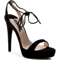 Sandały SCA'VIOLA - L732-1-1 Black. Czarne klapki damskie Sca'viola, bez wzorów, ze skóry, bez obcasa, na obcasie. W wyprzedaży za 329,00 zł.