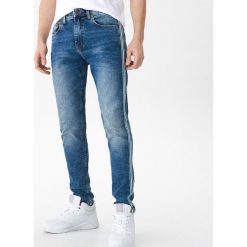 Jeansy slim fit z lampasami - Niebieski. Niebieskie jeansy męskie House, m, bez wzorów. W wyprzedaży za 29,99 zł.