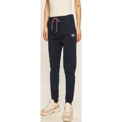 Tommy Jeans - Spodnie. Niebieskie spodnie dresowe damskie Tommy Jeans, s, z bawełny. W wyprzedaży za 229,90 zł.