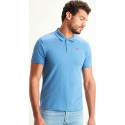 Levi's Housemark Polo Koszulka Niebieski. Niebieskie podkoszulki męskie Levi's®, s, bez wzorów, z bawełny, bez rękawów. Za 223,95 zł.