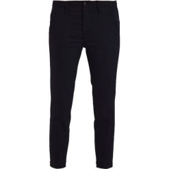 GStar BRONSON MID SKINNY CHINO Chinosy raw pressed. Niebieskie rurki damskie G-Star, z elastanu. W wyprzedaży za 351,75 zł.