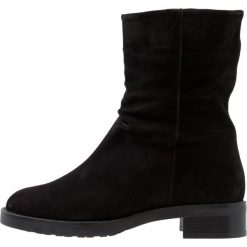 Högl Botki black. Czarne botki damskie marki HÖGL, z materiału. W wyprzedaży za 424,50 zł.