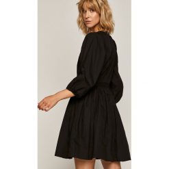 Medicine - Sukienka Timeless Black. Czarne sukienki damskie MEDICINE, na co dzień, s, bez wzorów, z bawełny, casualowe, bez kołnierzyka, bez rękawów, mini, rozkloszowane. W wyprzedaży za 109,90 zł.