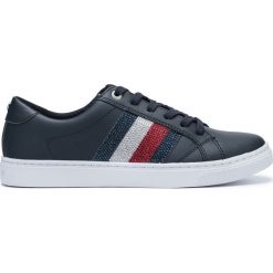 Tommy Hilfiger Tenisówki Niebieski. Niebieskie trampki i tenisówki damskie TOMMY HILFIGER, z aplikacjami, ze skóry, bez zapięcia. Za 426,95 zł.