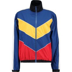 The Ragged Priest TRACK Kurtka wiosenna blue/red/yellow. Niebieskie bomberki damskie The Ragged Priest, s, z bawełny. Za 359,00 zł.