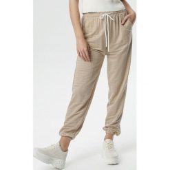 Beżowe Spodnie Make Me Wait. Brązowe spodnie damskie Born2be, s, z dresówki, sportowe. Za 59,99 zł.