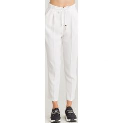 SPODNIE URBAN Elisabetta Franchi MOVES. Spodnie damskie Elisabetta Franchi, bez wzorów, z jeansu, eleganckie. W wyprzedaży za 714,45 zł.
