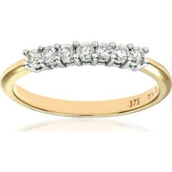 Złoty pieścionek z diamentami. Żółte pierścionki damskie REVONI, z diamentem, złote. W wyprzedaży za 1299,95 zł.