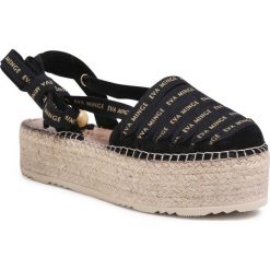 Espadryle EVA MINGE - EM-14-07-000728 801. Czarne espadryle damskie Eva Minge, bez wzorów, ze skóry, bez obcasa. W wyprzedaży za 369,00 zł.