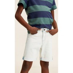 Mango Kids - Szorty dziecięce John 104-164 cm. Niebieskie spodenki chłopięce Mango Kids, z aplikacjami, z elastanu, casualowe. W wyprzedaży za 29,90 zł.