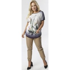 Czarno-Biała Bluzka Salolaeno. Czarne bluzki damskie Born2be, xl, bez wzorów, bez kołnierzyka, bez rękawów. W wyprzedaży za 39,99 zł.