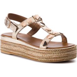 Espadryle INUOVO - 117012 Gold. Żółte espadryle damskie Inuovo, bez wzorów, ze skóry, bez obcasa. Za 389,00 zł.