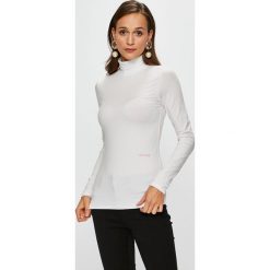 Calvin Klein - Bluzka. Białe bluzki damskie Calvin Klein, s, bez wzorów, z elastanu, z golfem. W wyprzedaży za 159,90 zł.