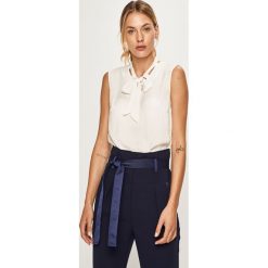 Morgan - Bluzka. Białe bluzki damskie Morgan, s, bez wzorów, z elastanu, bez kołnierzyka, bez rękawów. W wyprzedaży za 129,90 zł.
