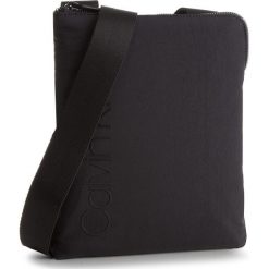 Saszetka CALVIN KLEIN - Straped Flat Crosso K50K503780 001. Czarne torby męskie skórzane Calvin Klein, bez wzorów, z materiału, młodzieżowe. W wyprzedaży za 239,00 zł.