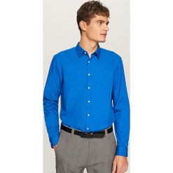 Elegancka koszula z tkaniny poplin - Niebieski. Niebieskie koszule męskie marki TRIBORD, m, z bawełny. Za 79,99 zł.