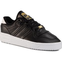Buty adidas - Rivalry Low FV3347 Cblack/Cblack/Ftwwht. Czarne buty sportowe męskie Adidas, na co dzień, bez wzorów, ze skóry ekologicznej, eleganckie, bez zapięcia. W wyprzedaży za 299,00 zł.