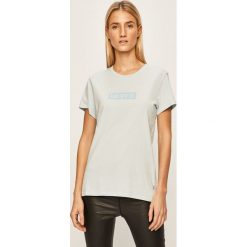Levi's - T-shirt. Niebieskie bluzki damskie Levi's®, s, z nadrukiem, z bawełny, z okrągłym kołnierzem. W wyprzedaży za 79,90 zł.