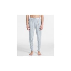 Spodnie treningowe Calvin Klein Jeans 000NM1582E JOGGER. Szare spodnie męskie Calvin Klein Jeans, xl, bez wzorów, z jeansu. Za 164,72 zł.