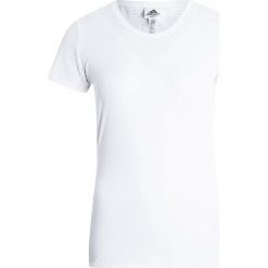 Adidas Performance FEMININE TEE Koszulka sportowa white. Białe topy sportowe damskie marki adidas Performance, xl, z elastanu. W wyprzedaży za 126,65 zł.