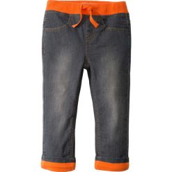 Dżinsy ocieplane na podszewce z dżerseju bonprix szary denim - pomarańczowy. Szare jeansy męskie z dziurami marki bonprix, z denimu. Za 44,99 zł.