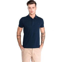 Lacoste Polo Koszulka Niebieski. Niebieskie podkoszulki męskie Lacoste, s, bez wzorów, z elastanu, bez rękawów. Za 447,95 zł.