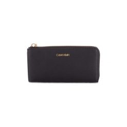 Portfele Calvin Klein Jeans K60K604503. Czarne portfele damskie marki Calvin Klein Jeans, z jeansu. Za 293,34 zł.