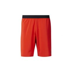 Szorty i Bermudy Reebok Sport Spodenki Speed. Czerwone spodenki sportowe męskie marki Reebok Sport, s, bez wzorów, sportowe. Za 169,00 zł.