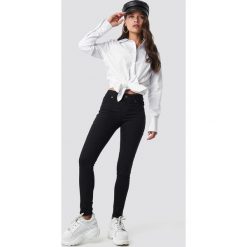 Cheap Monday Jeansy ze średnim stanem Spray - Black. Czarne jeansy damskie marki Cheap Monday. Za 161,95 zł.