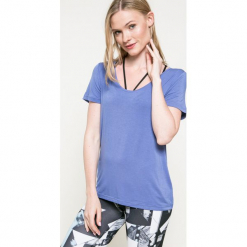 Reebok - Top. Niebieskie topy damskie marki Reebok, s, bez wzorów, z elastanu, z krótkim rękawem. W wyprzedaży za 49,90 zł.