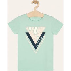 Guess Jeans - T-shirt dziecięcy 118-175 cm. Niebieskie bluzki dziewczęce z nadrukiem, z elastanu, z okrągłym kołnierzem, krótkie. Za 89,90 zł.