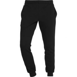 Lacoste Sport Spodnie treningowe black. Czarne spodnie męskie marki Lacoste Sport, m, bez wzorów, z bawełny, sportowe, długie. Za 459,00 zł.