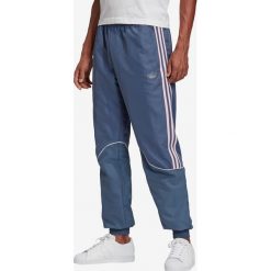 Adidas Originals O2K Spodnie dresowe Niebieski. Niebieskie spodnie męskie adidas Originals, l, bez wzorów, z poliesteru. Za 283,95 zł.