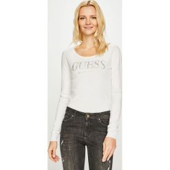 Guess Jeans - Sweter Emily. Czarne swetry damskie Guess Jeans, s, z aplikacjami, z elastanu, z krótkim rękawem, krótkie, bez kaptura. W wyprzedaży za 199,90 zł.
