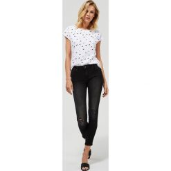 Jeansy skinny z przetarciami. Czarne jeansy damskie Moodo, m, bez wzorów, z elastanu, z podwyższonym stanem. Za 99,99 zł.