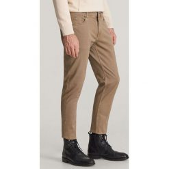 Spodnie z bawełny organicznej - Brązowy. Pomarańczowe spodnie męskie Reserved, m, z bawełny. Za 129,99 zł.