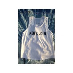 Karolcia. Białe bluzki damskie marki Kurdemol, l, bez wzorów, z bawełny, klasyczne, z klasycznym kołnierzykiem, bez rękawów. Za 59,00 zł.