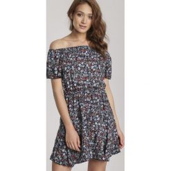 Granatowa Sukienka Laraime. Niebieskie sukienki damskie Renee, s, bez wzorów, bez kołnierzyka, bez rękawów, mini. Za 79,99 zł.