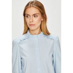 Calvin Klein - Koszula. Niebieskie koszule body damskie marki Calvin Klein, z elastanu, casualowe, ze stójką. W wyprzedaży za 299,90 zł.