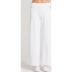 SPODNIE DRESOWE Armani Exchange. Białe spodnie damskie xs, z dresówki. Za 235,00 zł.