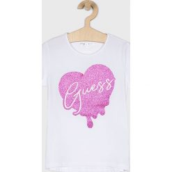 Guess Jeans - Top dziecięcy 118-175 cm. Białe bluzki dziewczęce Guess Jeans, z nadrukiem, z elastanu, z okrągłym kołnierzem, z krótkim rękawem, krótkie, bez kaptura. W wyprzedaży za 69,90 zł.