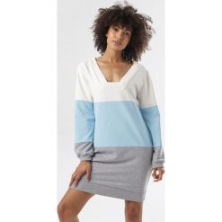 Jasnoniebieska Tunika Pereiphite. Niebieskie tuniki damskie Born2be, xl, bez wzorów, bez kołnierzyka, bez rękawów. W wyprzedaży za 74,99 zł.