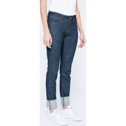 Wrangler - Jeansy. Niebieskie jeansy damskie rurki Wrangler, z aplikacjami, z bawełny. W wyprzedaży za 199,90 zł.