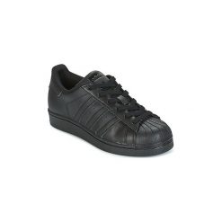Buty Dziecko adidas SUPERSTAR. Czarne trampki dziewczęce Adidas, bez wzorów, bez zapięcia. Za 309,00 zł.